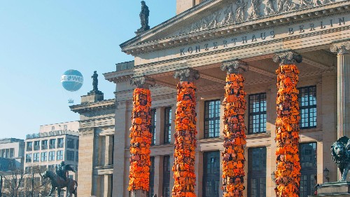 Photos: Artist Ai Weiwei has draped Berlin’s concert hall with 14,000 refugee life jackets
