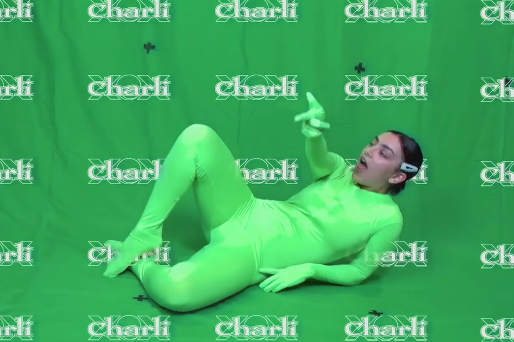 Charli XCX Parties in Front of a Greenscreen in 'Claws' Music Video