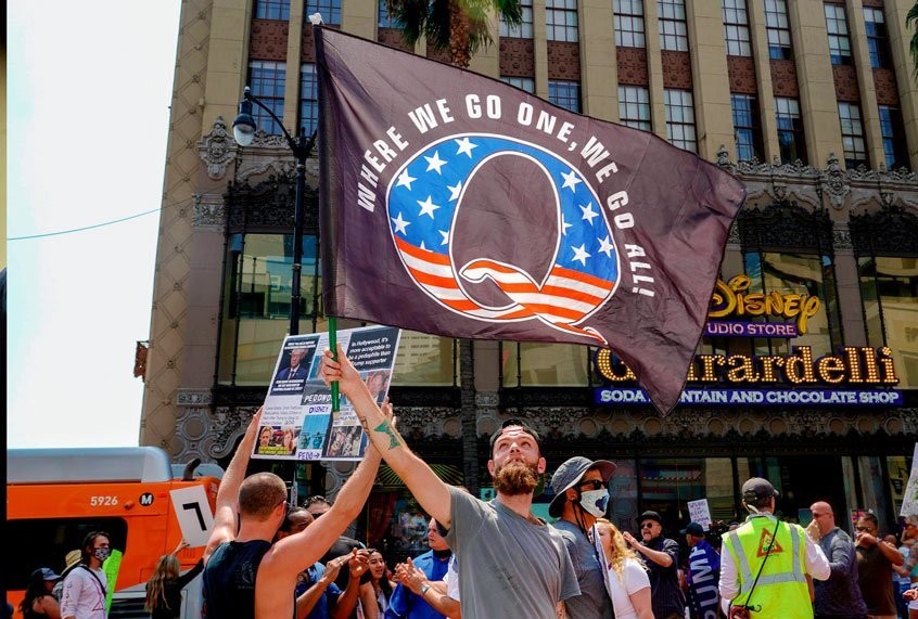 What is QAnon and why is it spreading?
