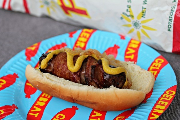 Unique Grilling: Crispin Cider-Steeped, Bacon-Wrapped Brats With Caramelized Hard Cider Onions