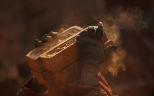 Chinese factory workers accept bricks in place of unpaid wages