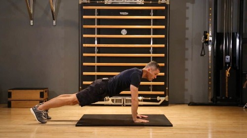 How to get fit for the slopes: plank with arm reach and rotation