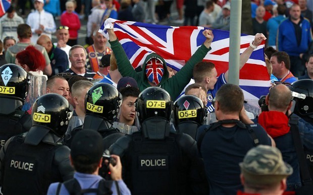 Hundreds of police from across UK to be deployed to Belfast after loyalist violence flares for third night