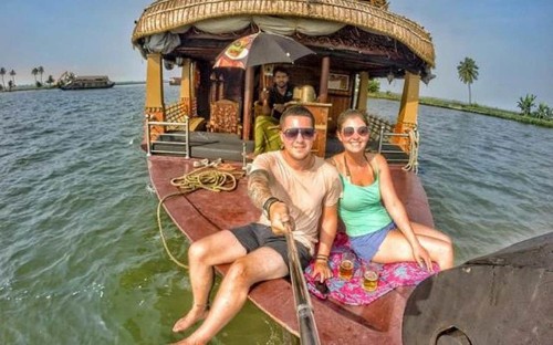 Young couple ditch dream jobs to live out of a rucksack and travel the world