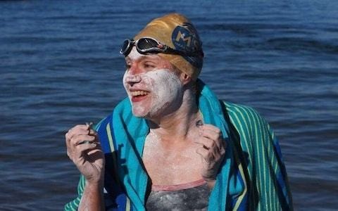 Cancer survivor becomes first to swim Channel four times non-stop, as scientists say being a woman was key to her success