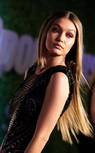 Gigi Hadid in Sports Illustrated is as skimpy as you'd expect. So how does the magazine secure fashion's biggest models?