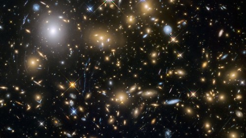 The Eerie Alignment of Ancient Giant Galaxies