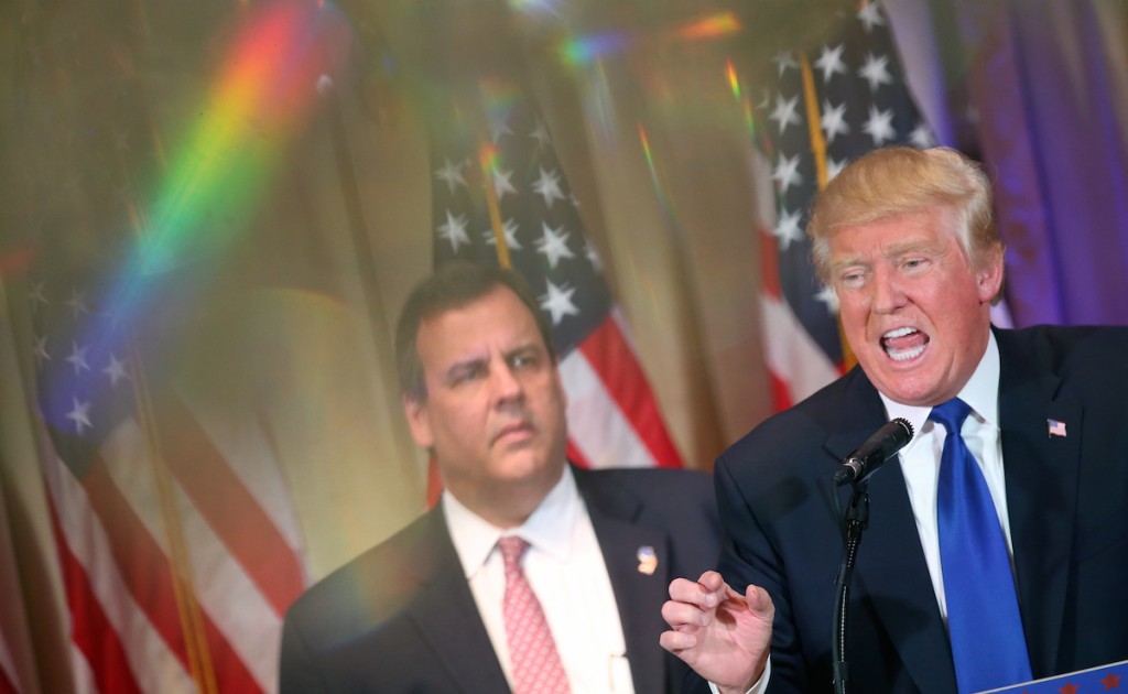 Donald Trump speaks at The Mar-A-Lago Club in Palm Beach, Fla., Tuesday, March 1, 2016, as New Jersey Gov. Chris Christie listens. (AP Photo/Andrew Harnik)