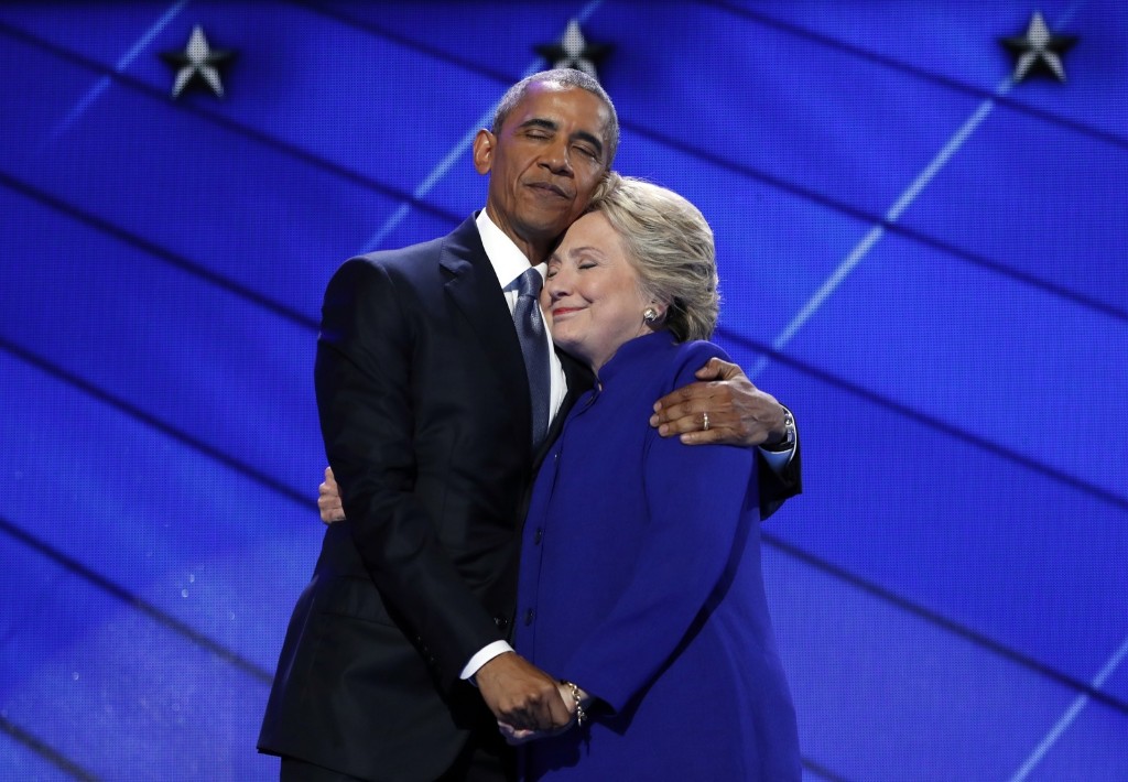 President Obama hugs Hillary Clinton after addressing the delegates. AP Photo/Carolyn Kaster