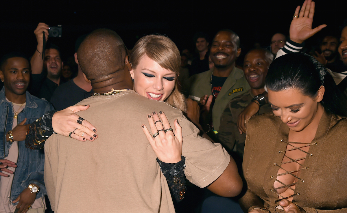 Recording artists Kanye West, Taylor Swift and TV personality Kim Kardashian during the 2015 MTV Video Music Awards at Microsoft Theater on August 30, 2015 in Los Angeles, California. Jeff Kravitz/MTV1415/FilmMagic