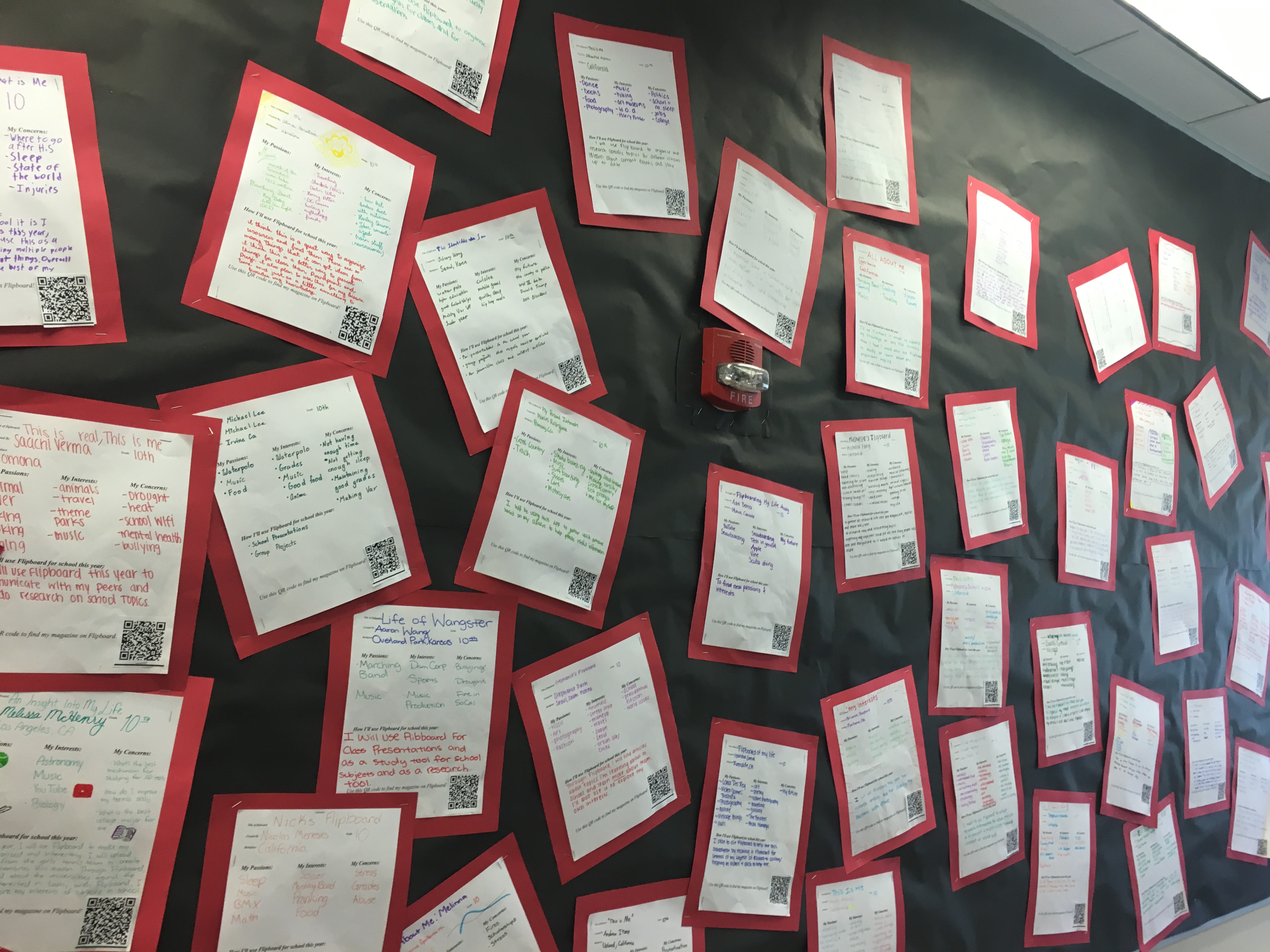 Wall of student introductions, "WHO I AM” with a QR code to their Flipboard Magazines. This is how Mr. Weidman's students get to know each other. 