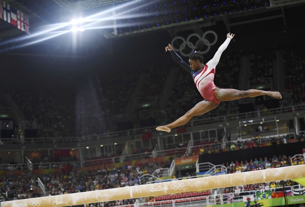 Simone Biles on the beam. REUTERS/Dylan Martinez