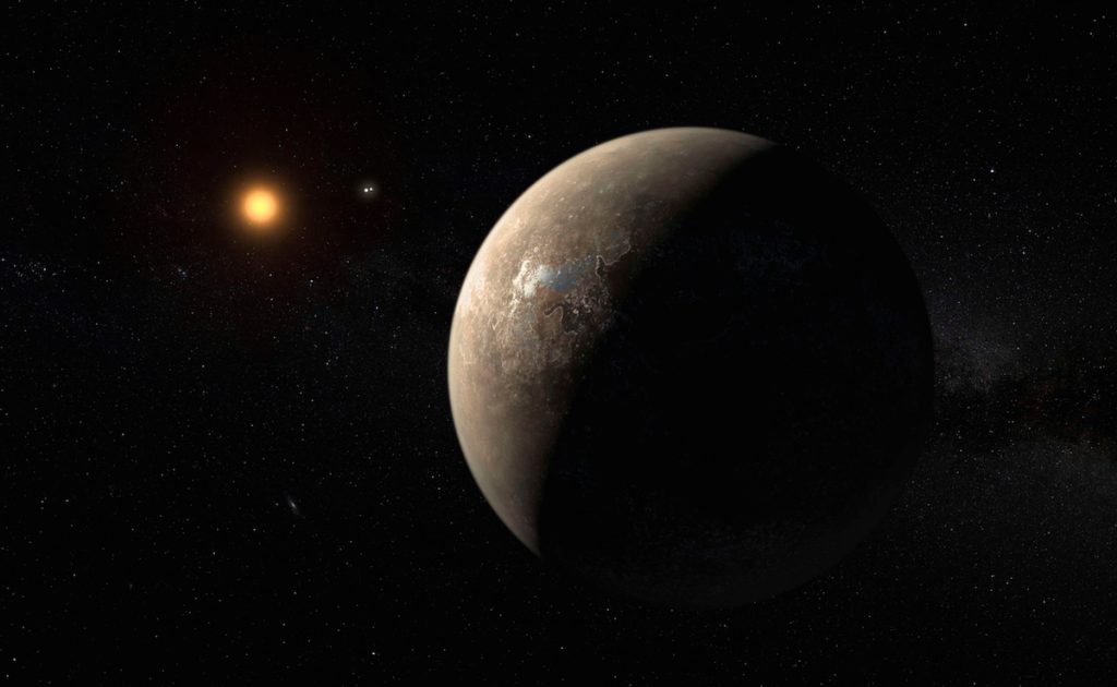 The planet Proxima b orbiting the red dwarf star Proxima Centauri, the closest star to our Solar System, is seen in an undated artist's impression released by the European Southern Observatory August 24, 2016.   ESO/M. Kornmesser/Handout via Reuters