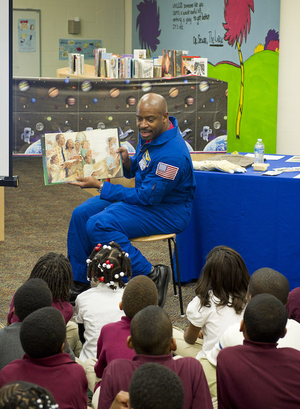 Leland Melvin, NASA Associate Administrator for Education and former space shuttle astronaut, reads to first and third grade students from the book “The Moon Over Star” at Ferebee-Hope Elementary School on Tuesday, Feb. 8, 2011, in Washington, DC. Ferebee-Hope Elementary School, in collaboration with Reading is Fundamental (RIF), hosted this event in honor of Black History Month, and to highlight the importance of reading. Reading is Fundamental distributes more than 50,000 free books to help children discover the joy of reading. Photo Credit: (NASA/Carla Cioffi)