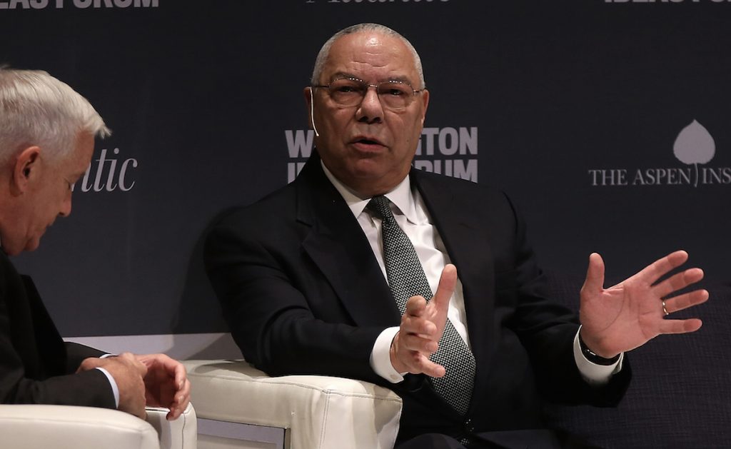 Former U.S. Secretary of State Colin Powell (R) speaks with Walter Isaacson (L) during an appearance at the Washington Ideas Forum September 30, 2015 in Washington, DC. Win McNamee/Getty Images