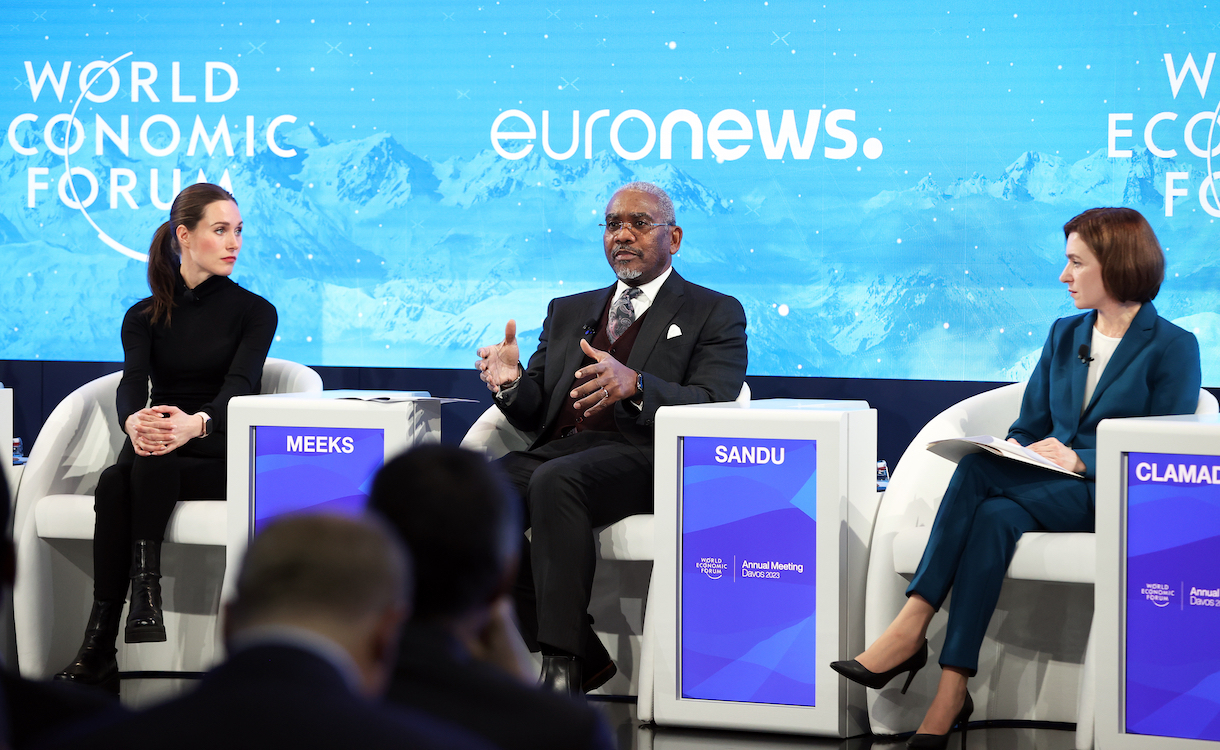 US House Foreign Affairs Committee Chairman Gregory Meeks, President of Moldova Maia Sandu and Prime Minister of Finland Sanna Marin sitting on stage at World Economic Forum 2023 in Davos, Switzerland.
